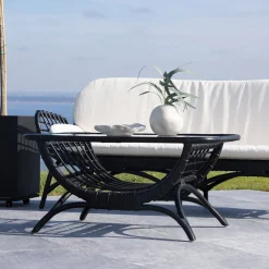 Loungetafel Britini Rattan en glas, 95 x 60cm
